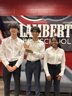 Full Court Analysts, the student team from Lambert High School, poses with their first place trophy.